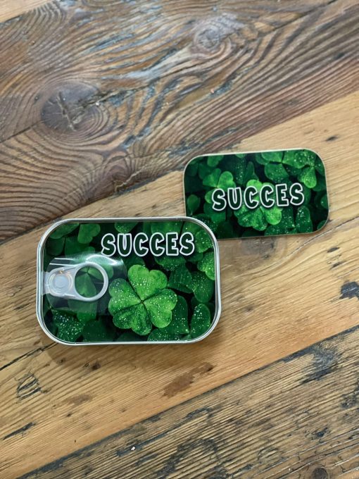 Blikjes post Succes