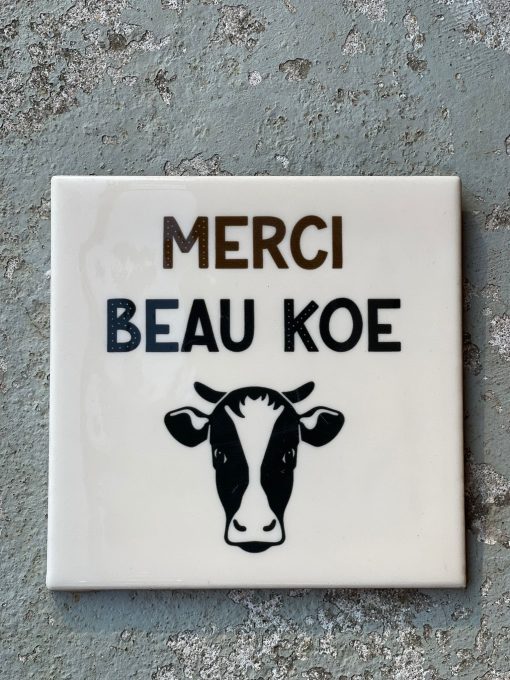 Tegeltje spreuktegel Merci beau koe